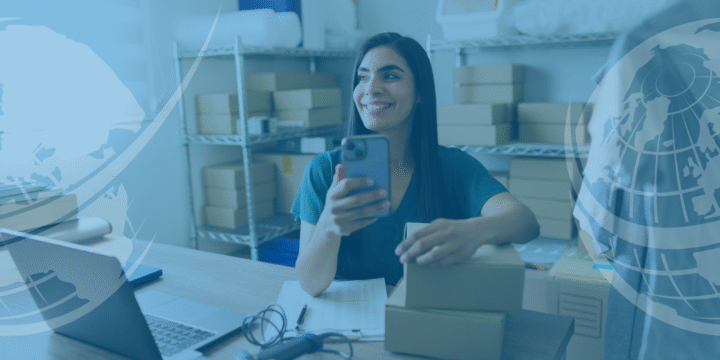 Lady looking at her mobile phone and dealing with parcels